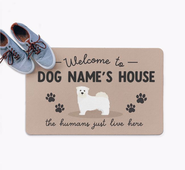 The Humans Just Live Here: Personalized {breedFullName} Doormat